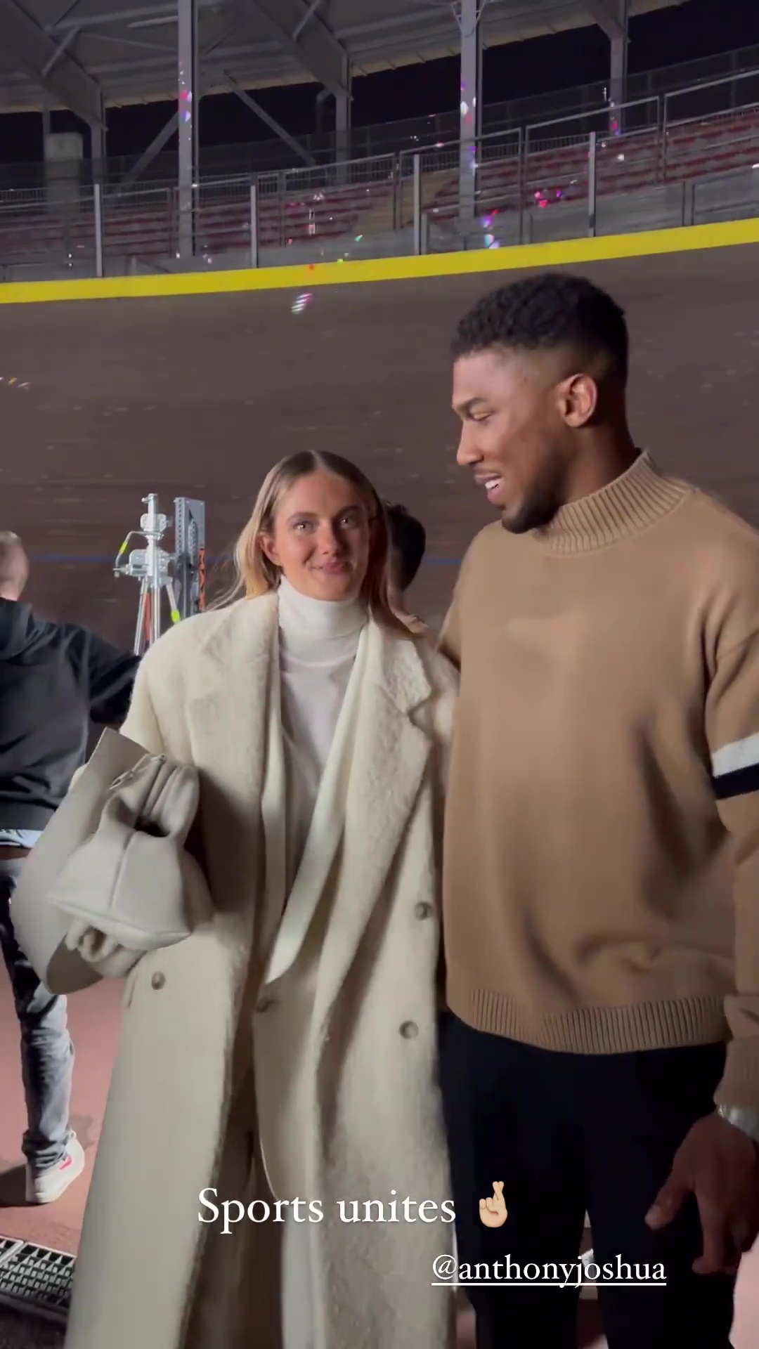 At Milan Fashion Week, Anthony Joshua embraces Alica Schmidt (the 'world's most sexy athlete) and Naomi Campbell