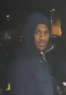 Anthony Joshua gives PS20 notes to shocked children in Watford, where he grew-up.