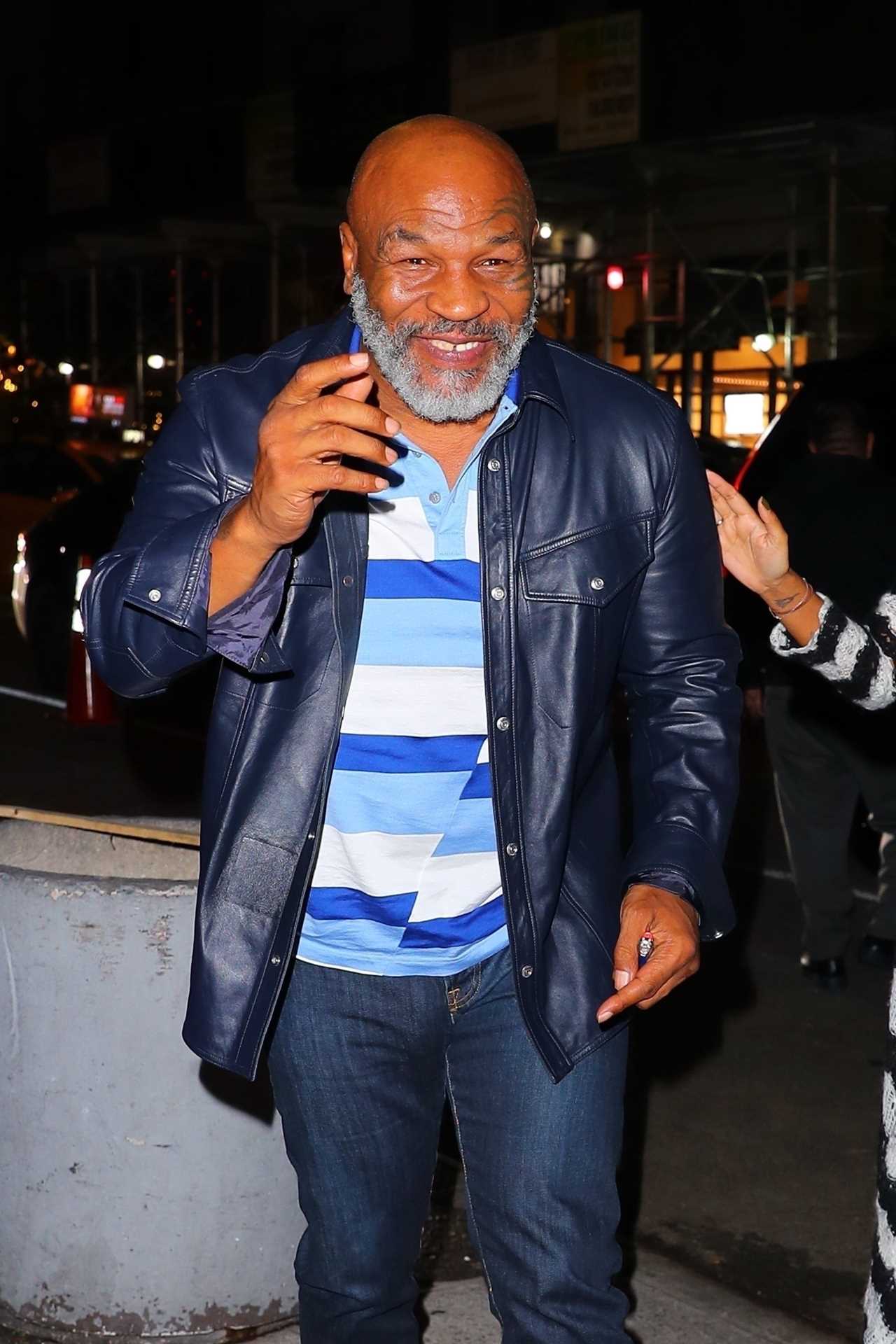 Mike Tyson, 56 years old, is in good spirits as he goes out to dinner with a woman who has been unable to walk or speak due to a health battle