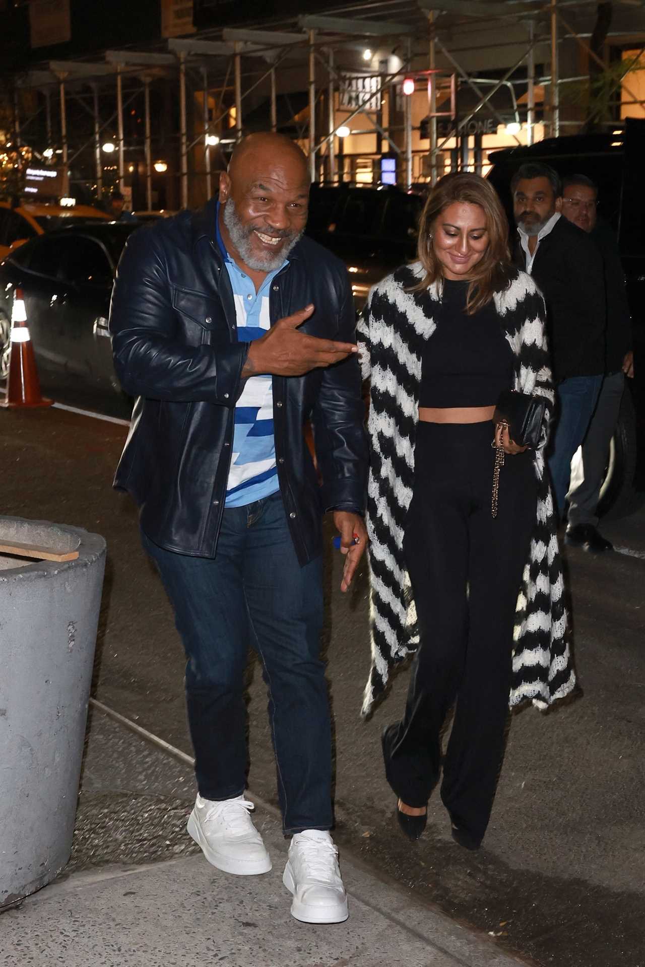 Mike Tyson, 56 years old, is in good spirits as he goes out to dinner with a woman who has been unable to walk or speak due to a health battle