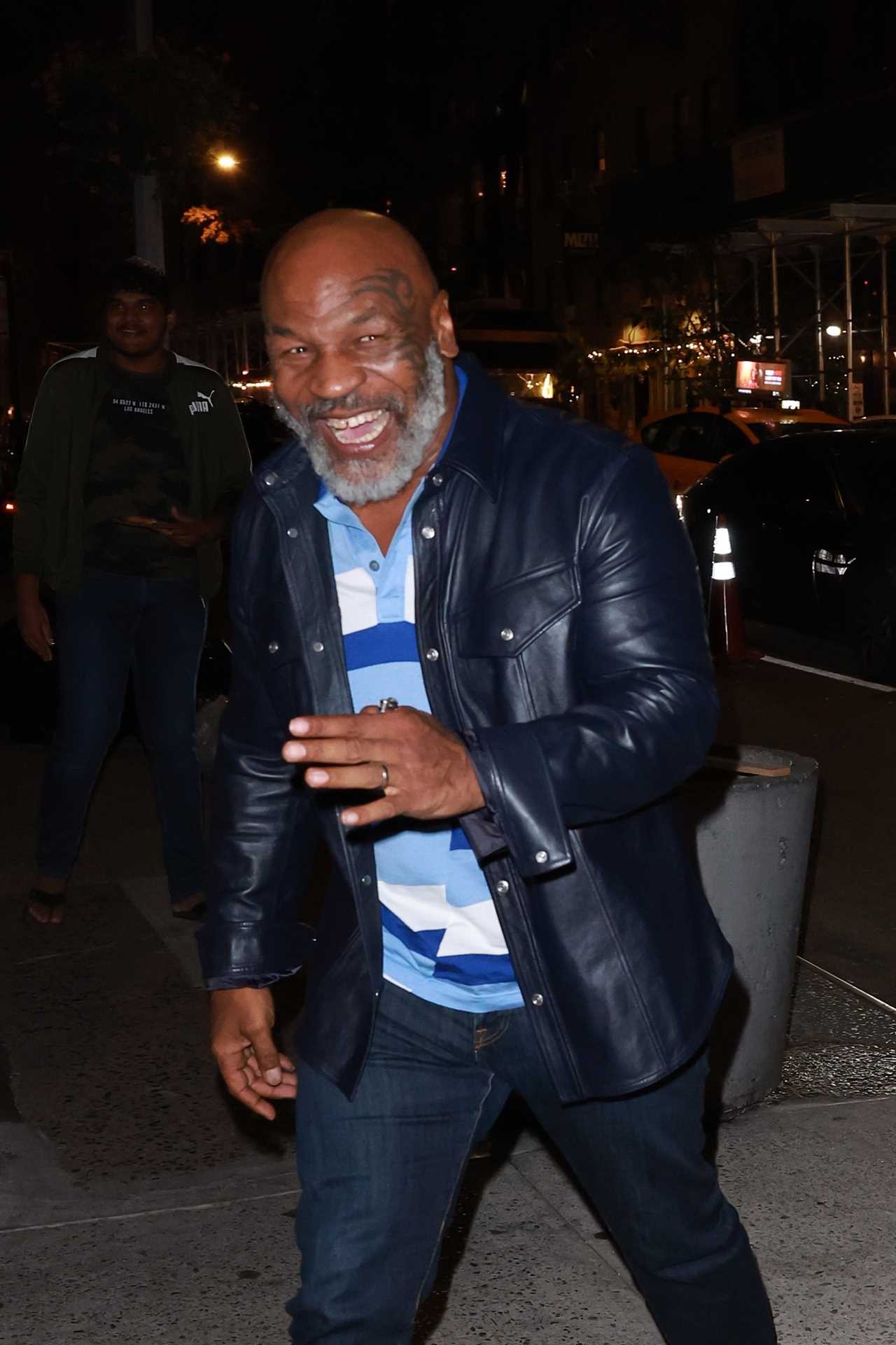 Mike Tyson, 56 years old, is in good spirits as he goes out to dinner with a woman who has been unable to walk or speak due to a health battle