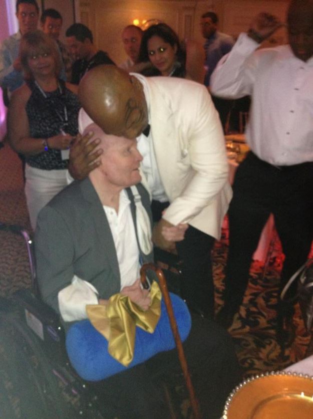 Ref Mills Lane is hugged by Mike Tyson in a touching throwback snap, years after he was disqualified for biting Holyfield's ears off