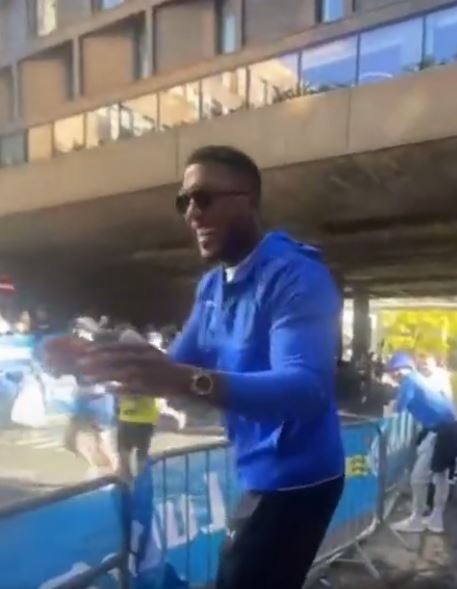 London Marathon runners stunned by Anthony Joshua's handing out drink tickets to runners, as Tyson Fury fight talk rumbles on