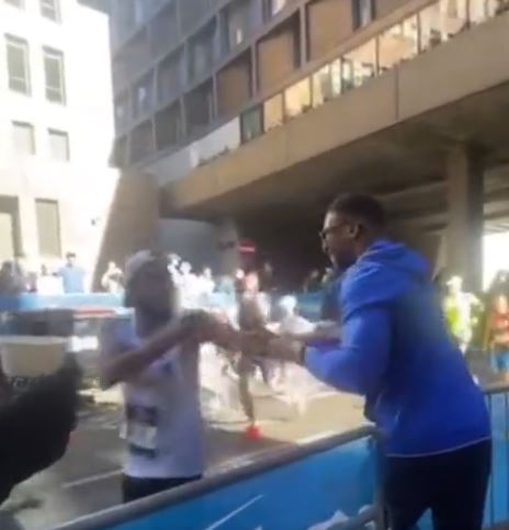 London Marathon runners stunned by Anthony Joshua's handing out drink tickets to runners, as Tyson Fury fight talk rumbles on