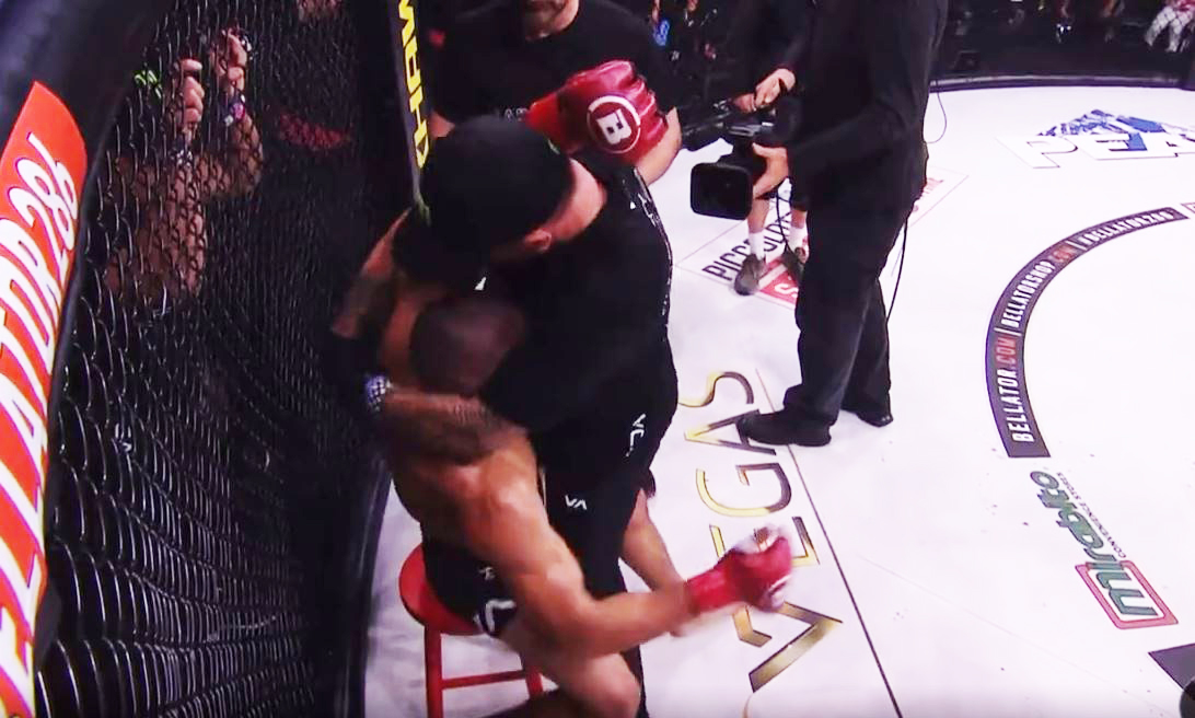 Watch as Aaron Pico, MMA fighter, pushes his cornerman back into the fighter's shoulder after it popped out during bout