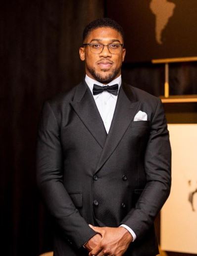 Suited-up Anthony Joshua picks up another title as he’s given History Maker Award at Best of Africa bash