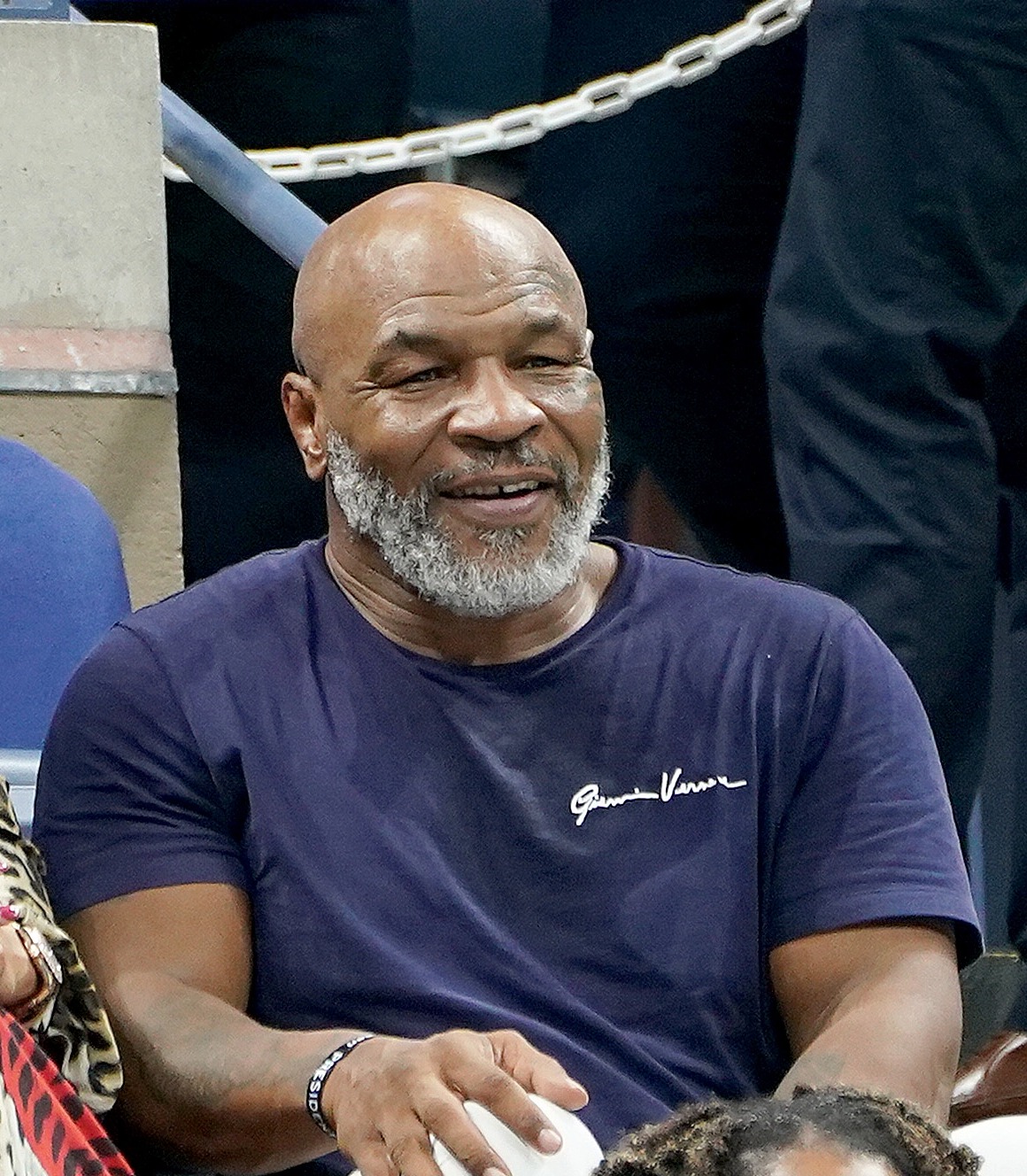 Photographer claims Mike Tyson tried to grab his breast during shoot, but he insists that they were in a sexual relationship