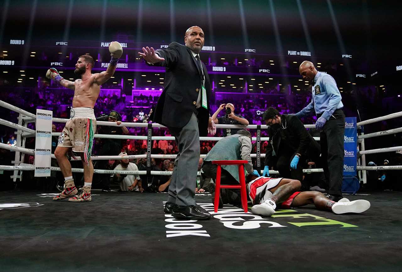Caleb Plant is tackled by referee after he did a 'digging grave celebration' following the brutal Anthony Dirrell KO