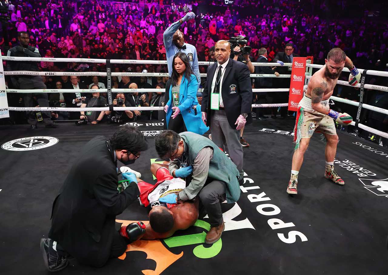 Caleb Plant is tackled by referee after he did a 'digging grave celebration' following the brutal Anthony Dirrell KO