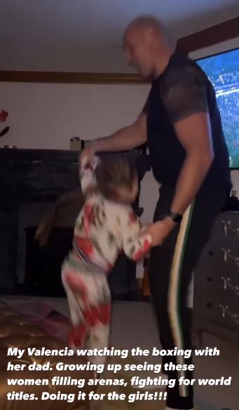As Shields wins over Marshall, Tyson Fury and Valencia dance with their daughter Valencia.