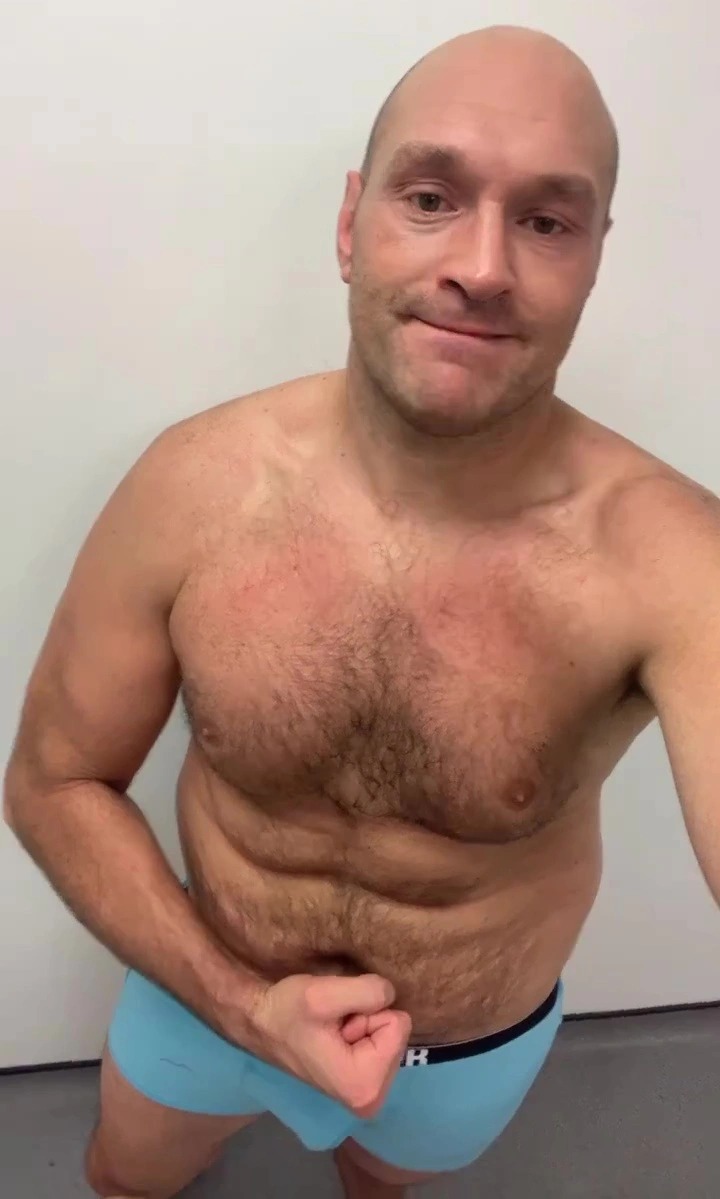 ‘Solid as a rock’ – Topless Tyson Fury shows off incredible abs as he poses in his boxers ahead of Derek Chisora trilogy