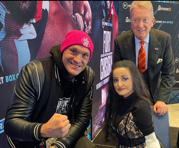 Kind hearted Tyson Fury donates entire £10k bet won off Frank Warren to charity – and hands it over in wads of CASH