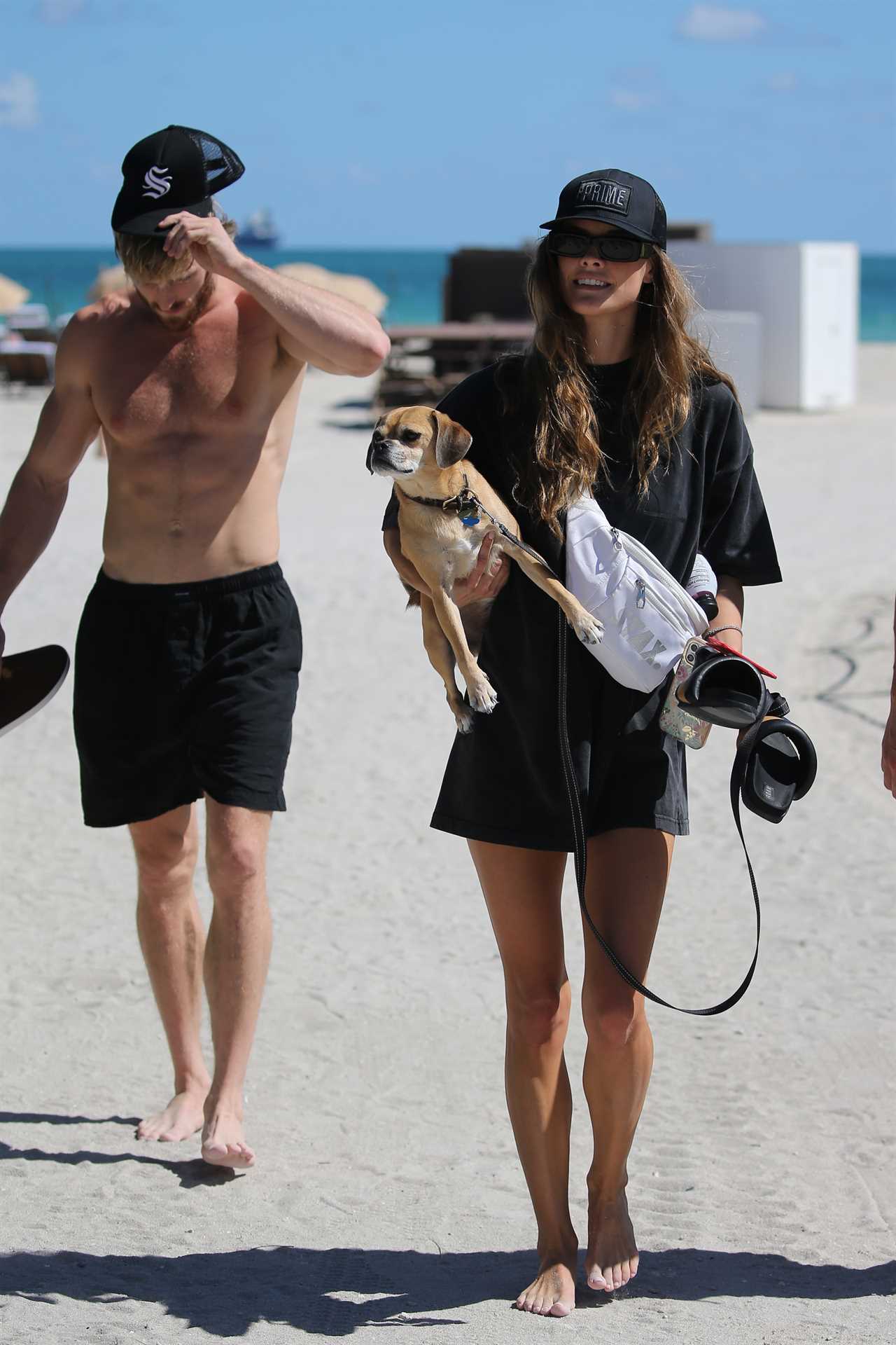 Logan Paul heads for beach break with stunning model girlfriend Nina Agdal ahead of brother Jake’s fight this weekend