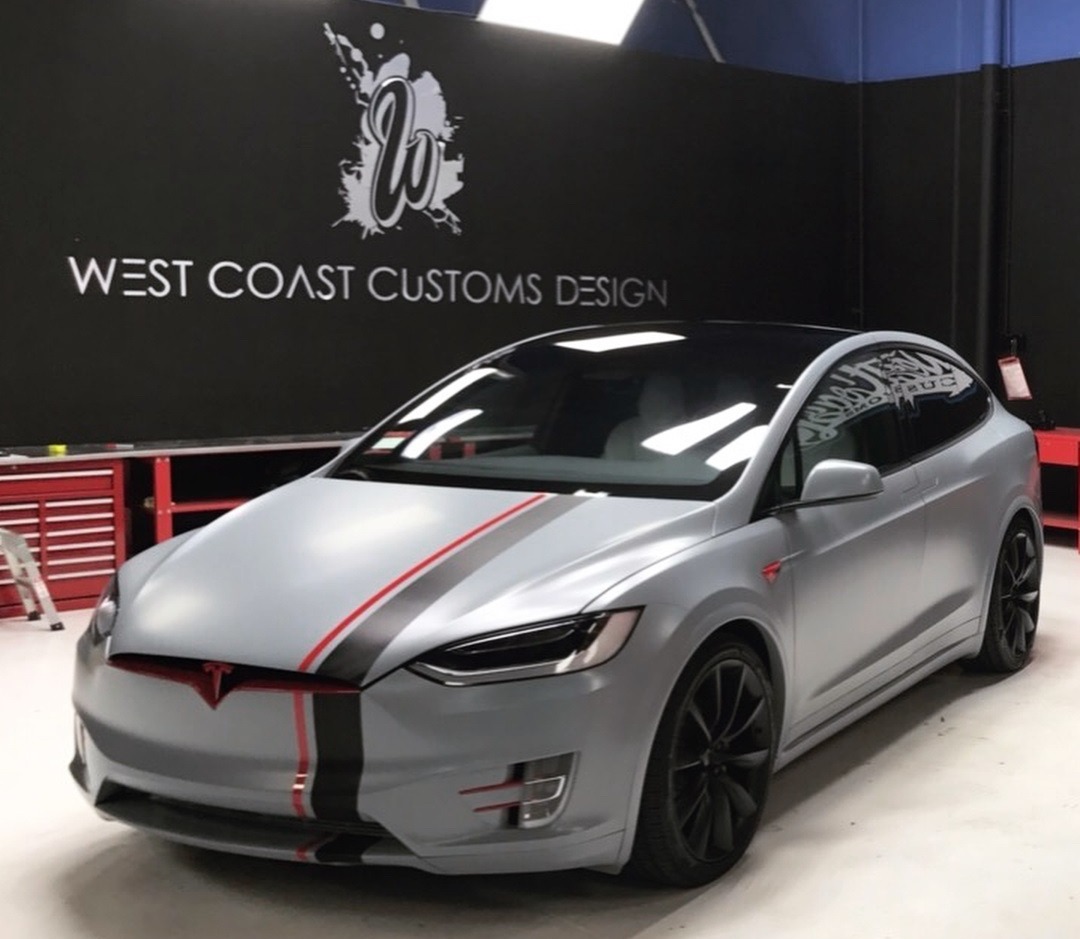 Inside Jake Paul’s insane car collection that includes a £165k Lamborghini Huracan, and a custom-wrapped £81k Tesla