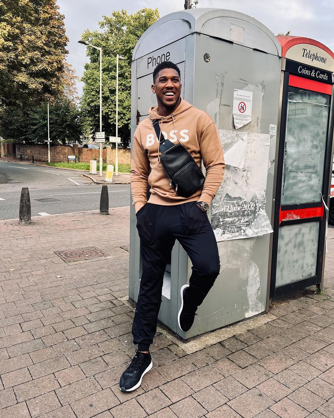 After confirming his desire to fight Tyson Fury next year, Anthony Joshua returns home and smiles all the way.