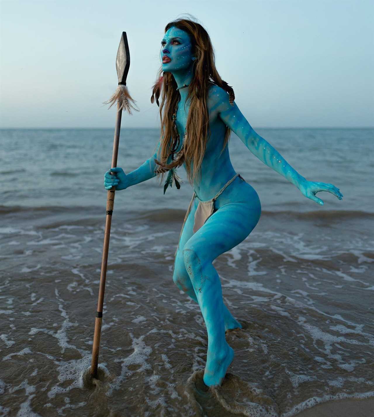 Jake Paul and Julia Rose, his stunning girlfriend, strip naked and dress up as Avatar characters for a bizarre Halloween shoot