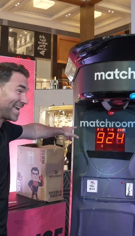 Eddie Hearn's punchbag machine explodes, leaving stunned viewers in shock.