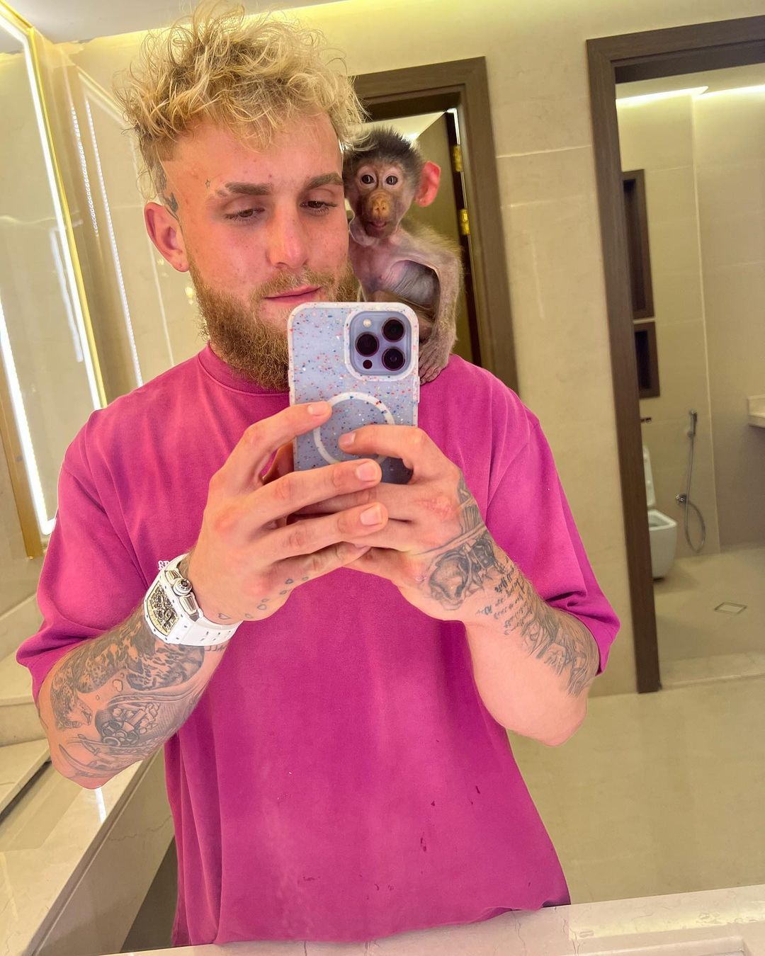 Jake Paul channeled Mike Tyson's inner Mike Tyson, posing with TIGER as he leads the YouTuber's fight against Tommy Fury.