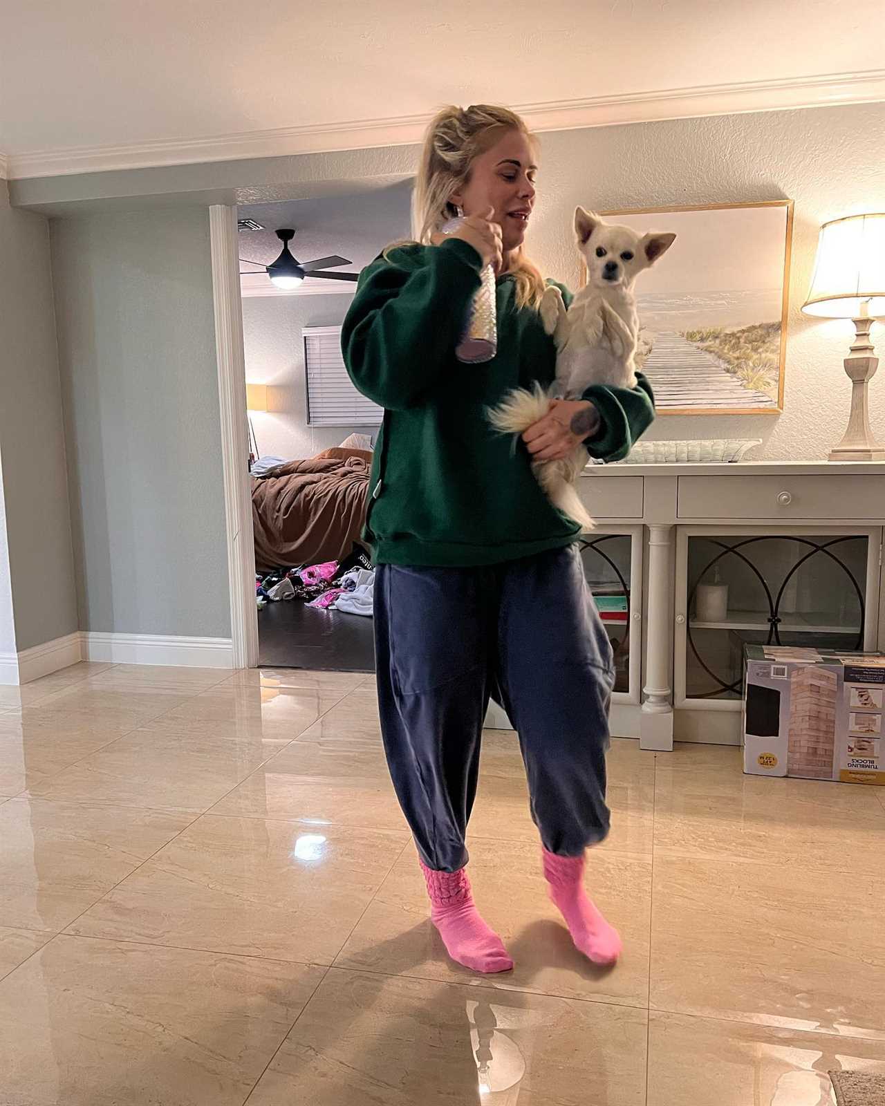 Ex-UFC star Paige VanZant looks stunning in a tiny bikini, but her husband is less glamorous