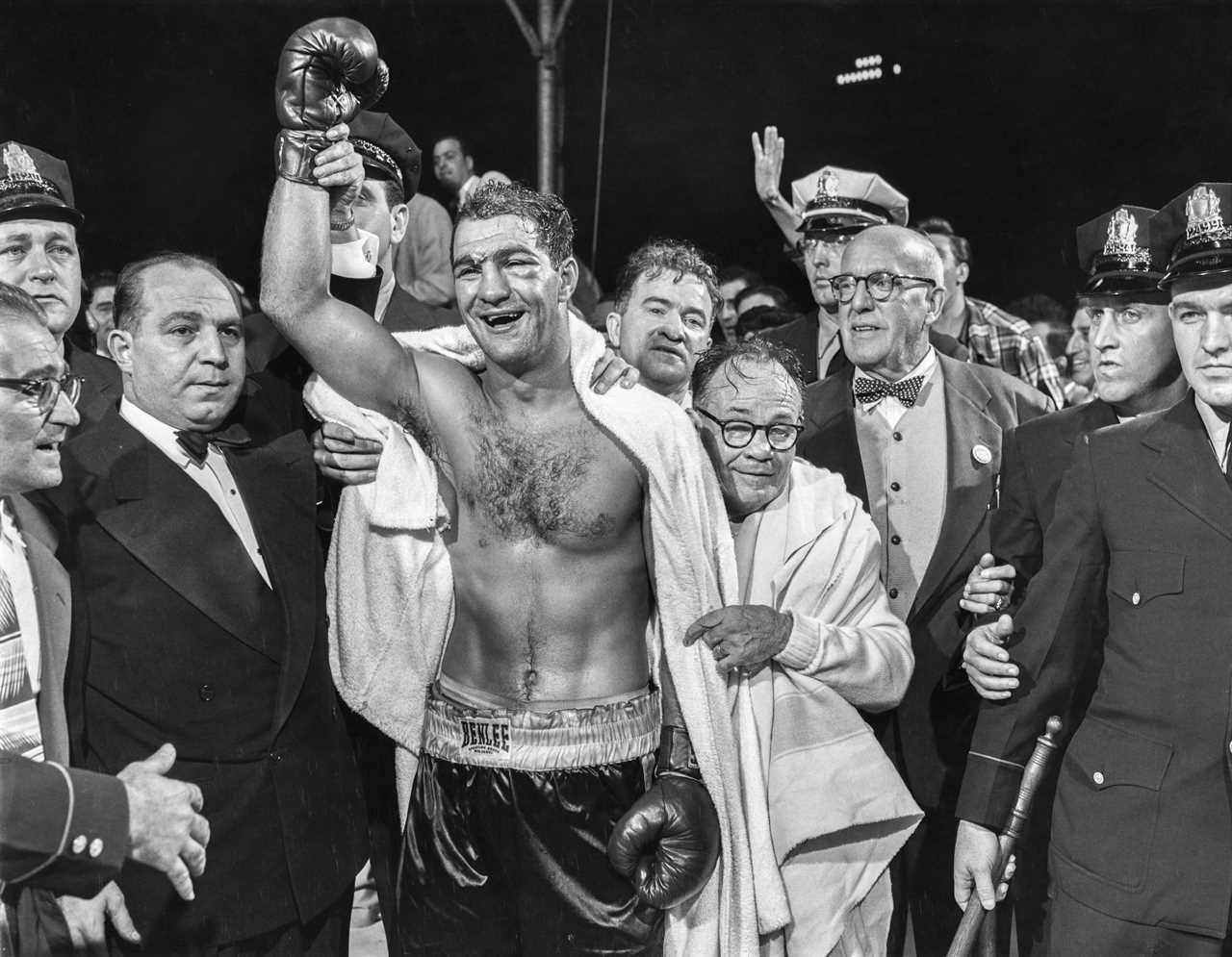 George Foreman lists the top ten heavyweights, but Fury is out of contention as Lennox Lewis defeats Tyson