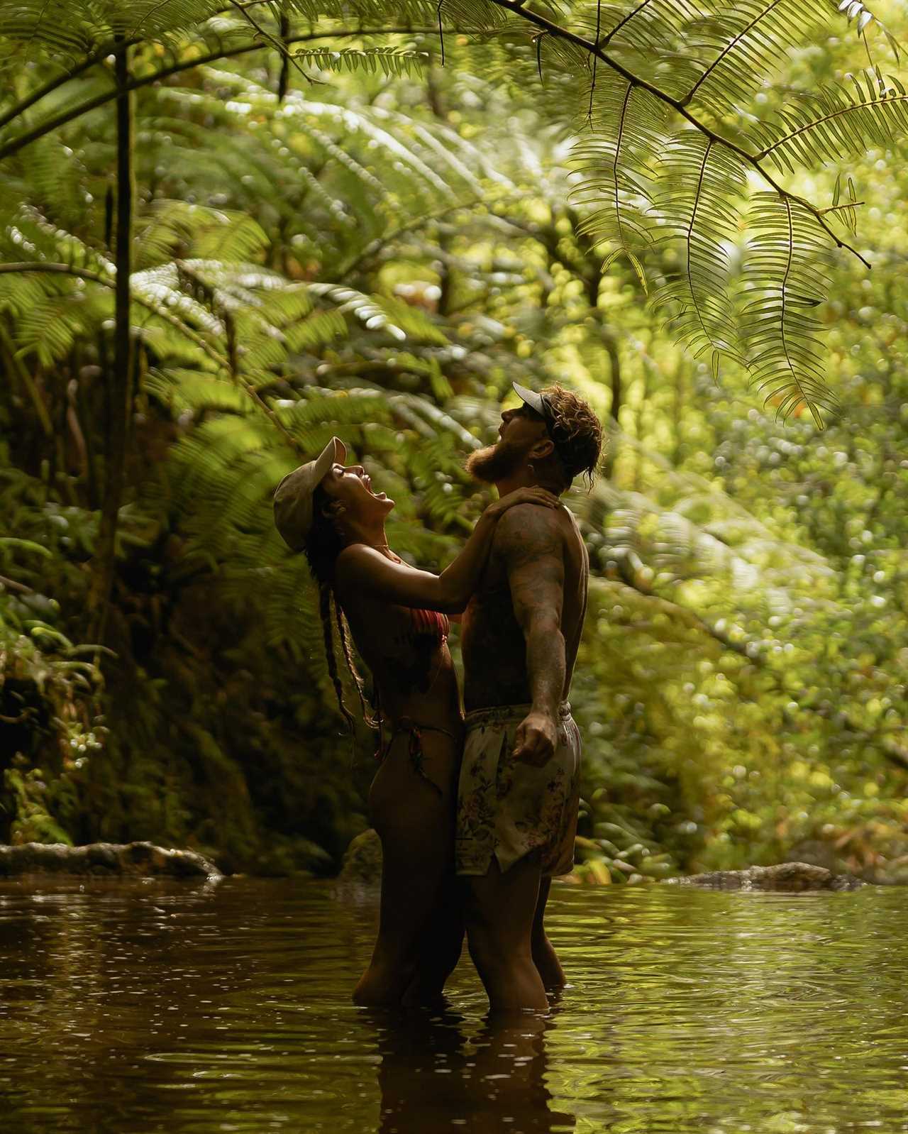 Julia Rose and Jake Paul have little to no imagination as they lounge in a waterfall pool during their Hawaii vacation.