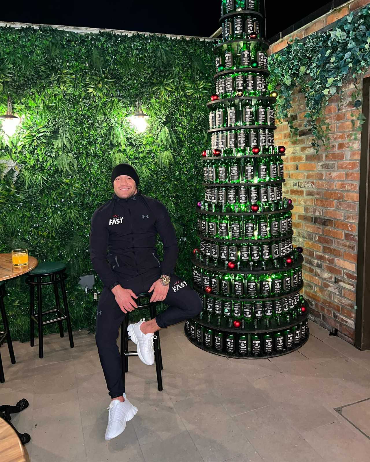 Conor McGregor creates CHRISTMAS TREE from Proper 12 whiskey bottles to celebrate UFC's star.