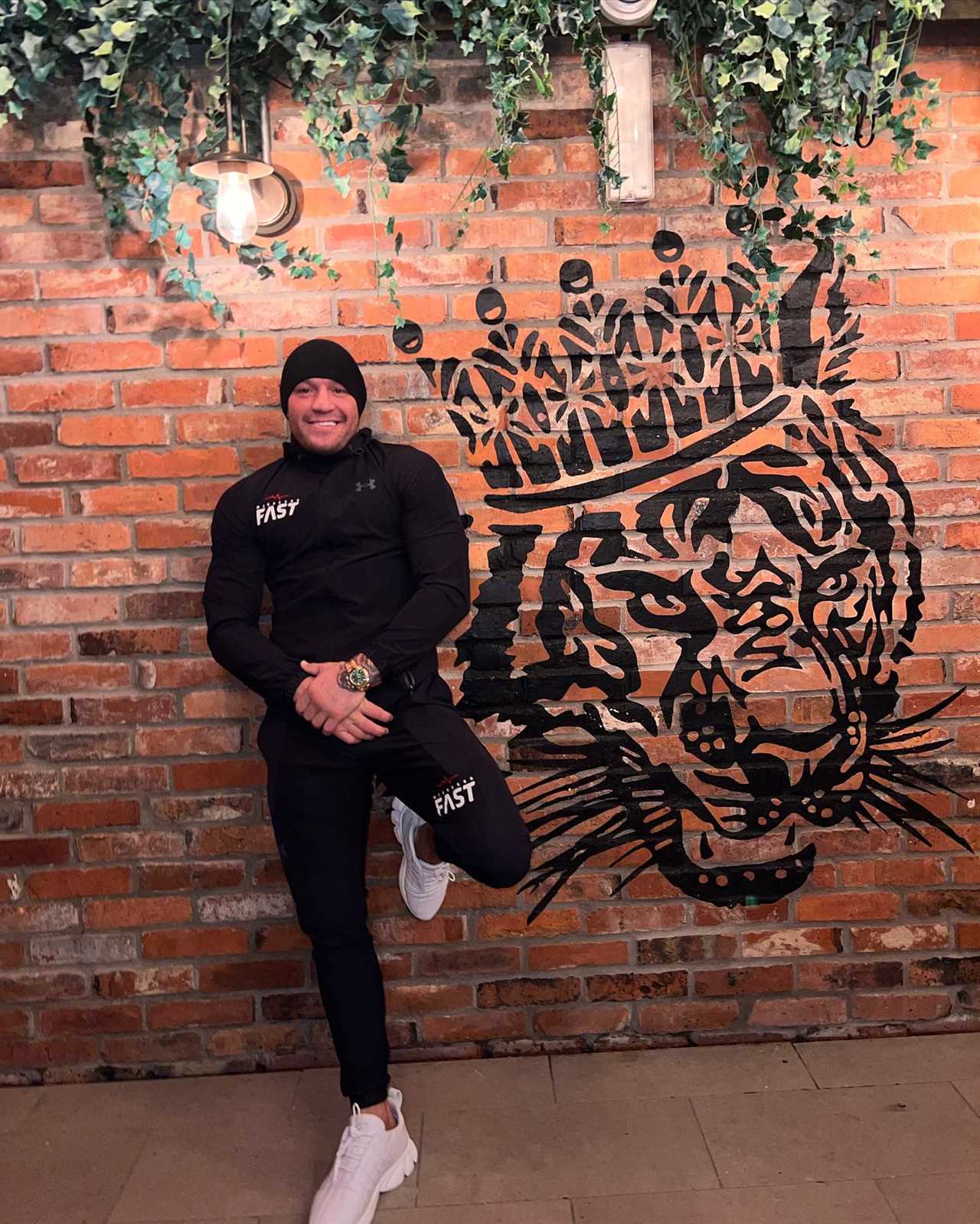 Conor McGregor creates CHRISTMAS TREE from Proper 12 whiskey bottles to celebrate UFC's star.