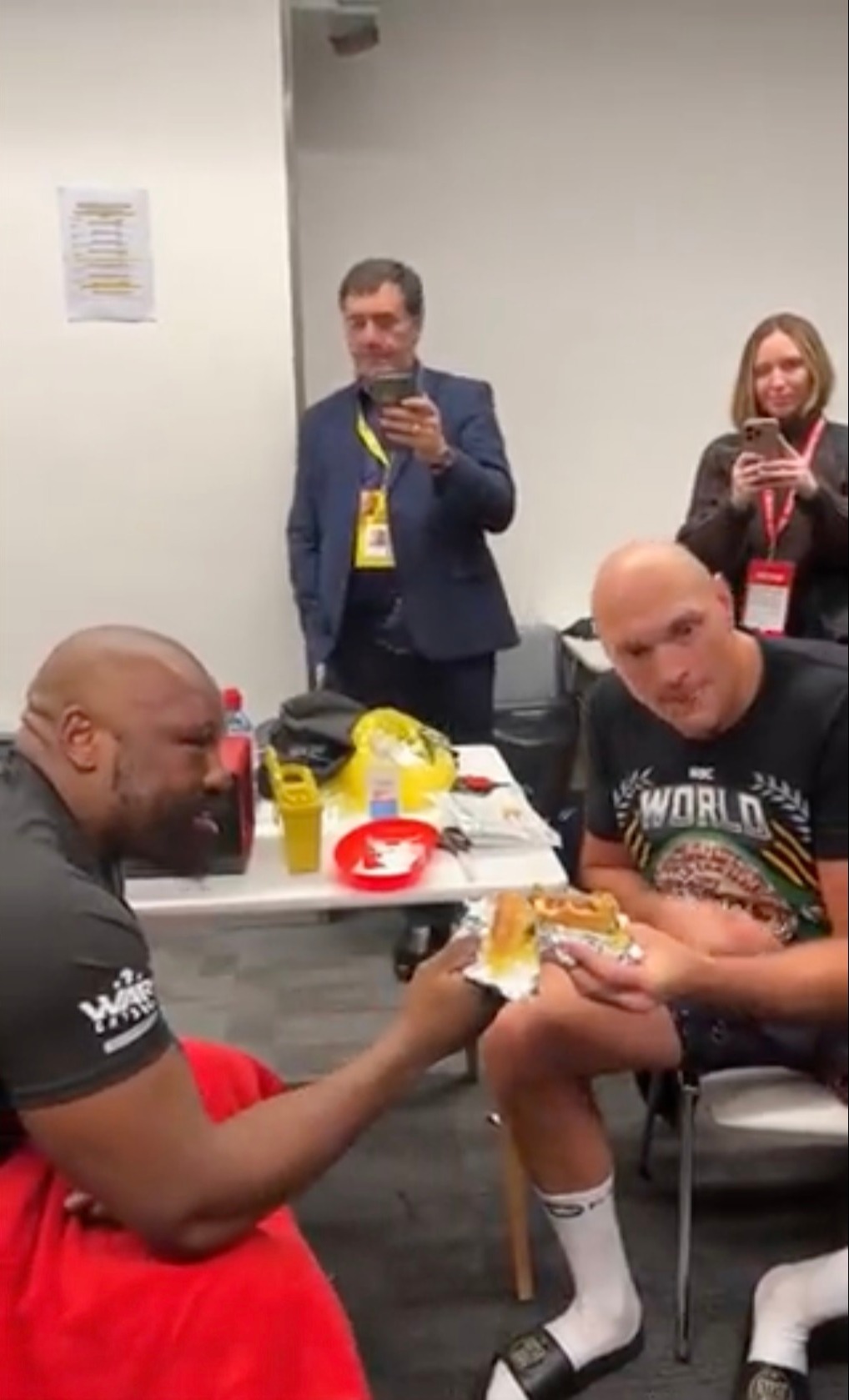 Watch the heartwarming moment Tyson Fury meets Derek Chisora to share burgers after a brutal fight