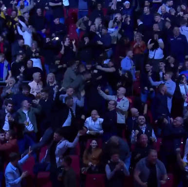 England fans cheer on Josh Warrington as they see Three Lions beat France in the World Cup.