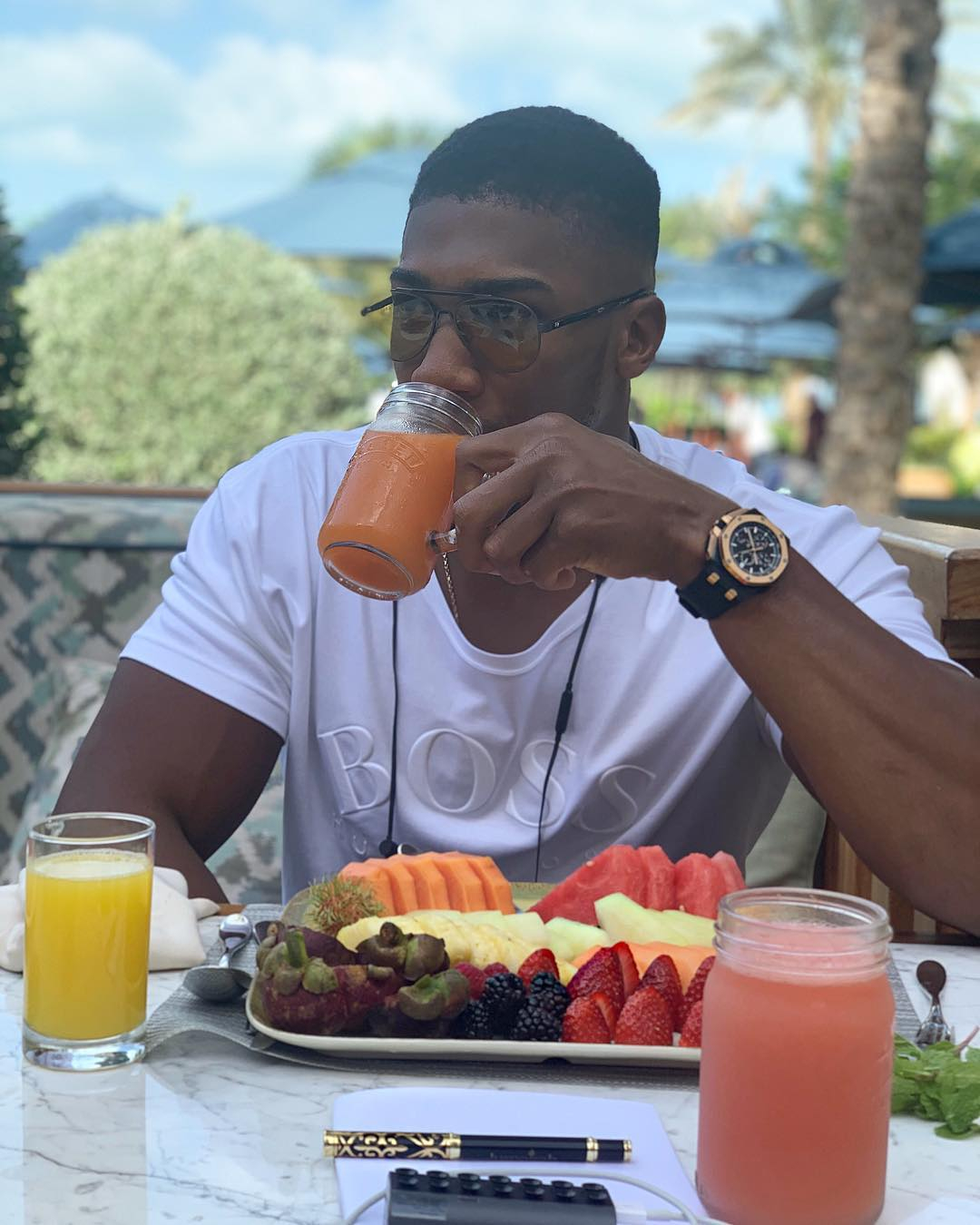 Anthony Joshua's lavish lifestyle - with luxury cars, vacations and private jets - all without spending a fortune