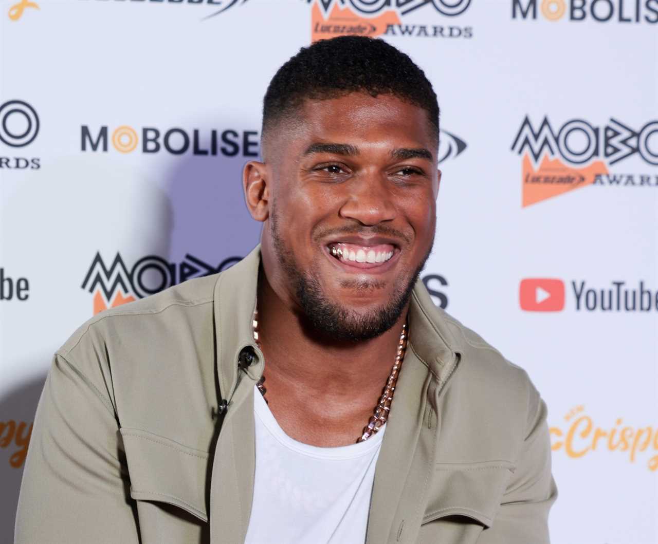 Deontay Wilder and Anthony Joshua are in talks to fight as Eddie Hearn confirms that there is 'lots going down' during huge showdown