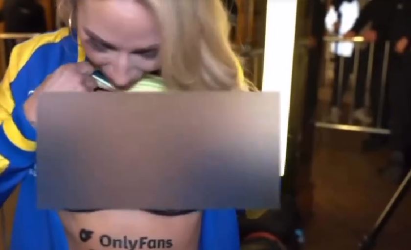 Watch Ebanie bridges' stunned reaction as a boxer flashes his boobs during an interview after OnlyFans launch