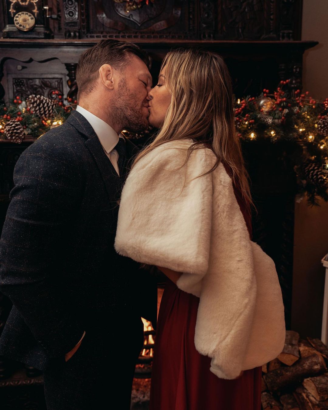 Conor McGregor, Dee Devlin and all smiles while they share a romantic moment to celebrate her sister's wedding.