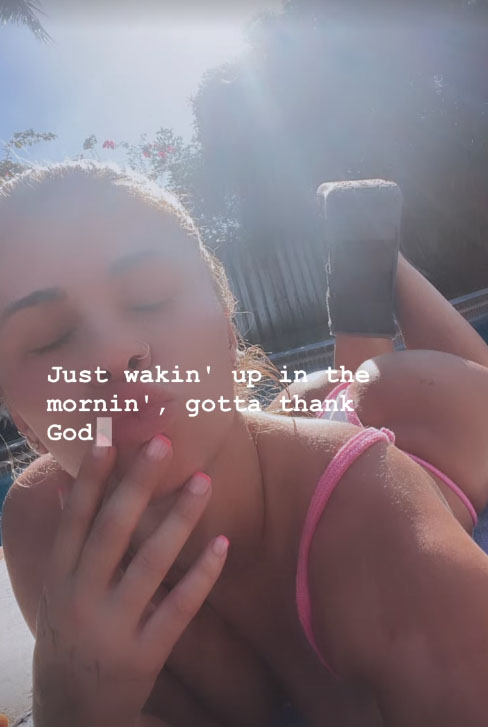 Paige VanZant flaunts her bum in a tiny bikini while ex-UFC beauty rests by the pool