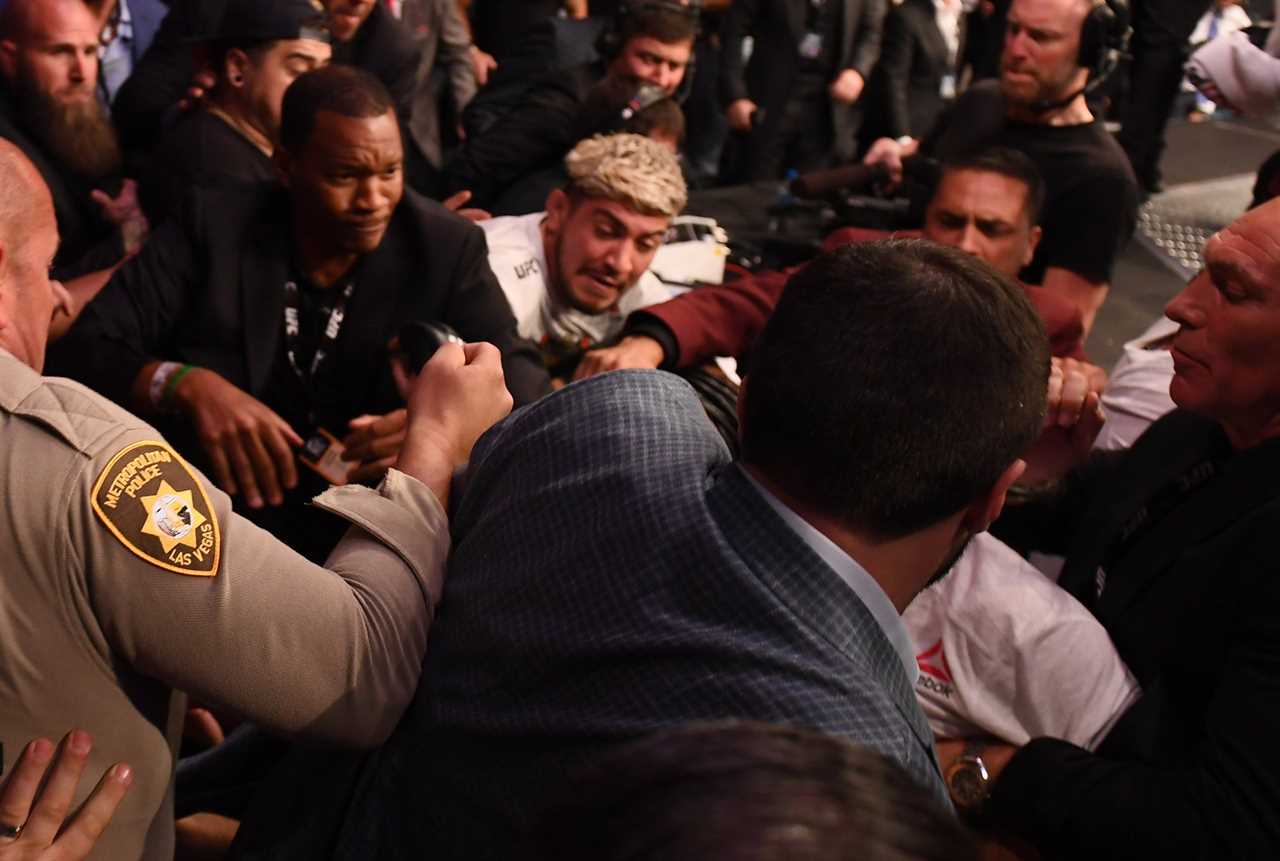 Never-before-seen footage shows Conor McGregor punching Khabib's partner in brutal post-fight brawl