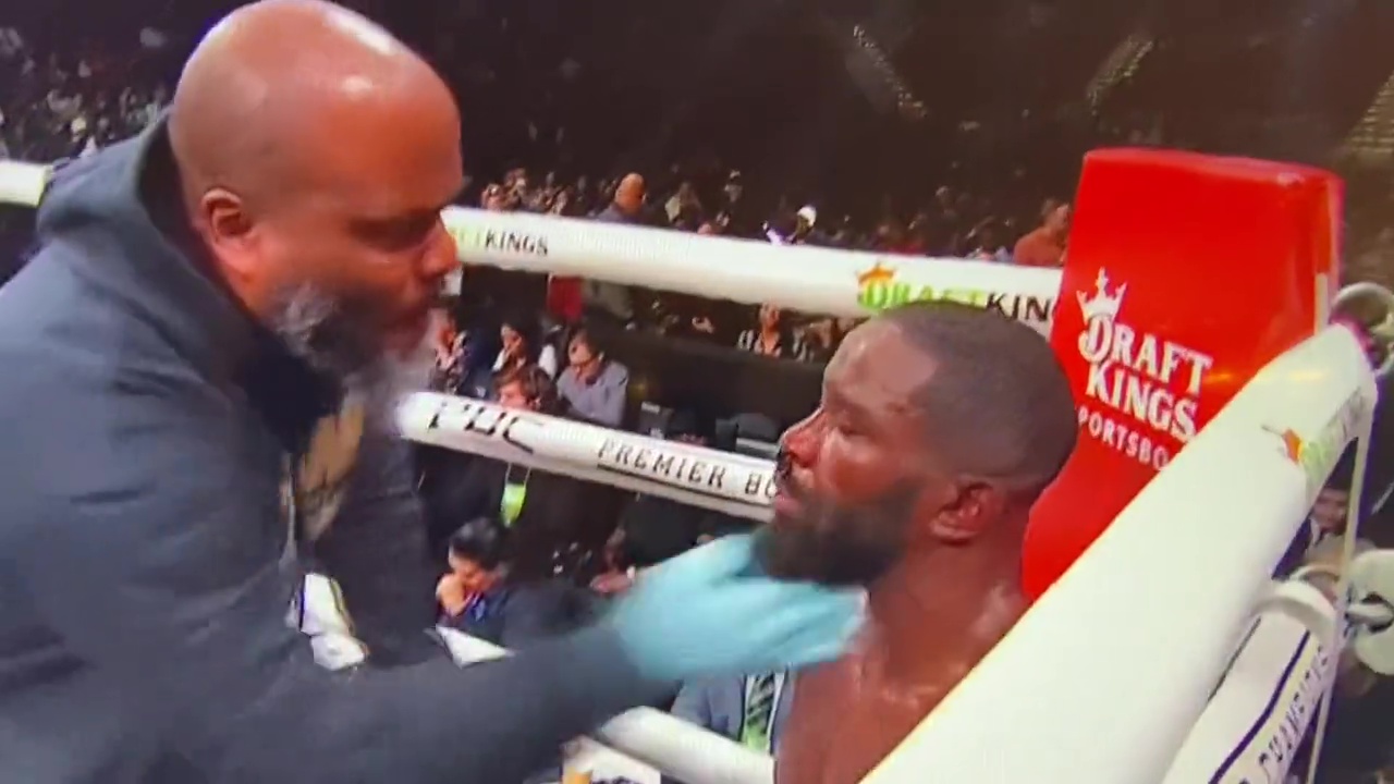 Watch Demond Nicholson, boxer, get repeatedly SLAPPED by his coach in the corner during heavy points loss against Demetrius Andrade