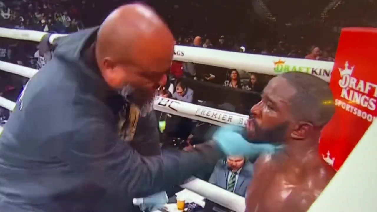 Watch Demond Nicholson, boxer, get repeatedly SLAPPED by his coach in the corner during heavy points loss against Demetrius Andrade