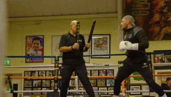 Conor McGregor's biceps are insane as the UFC star trains for his return to his childhood gym