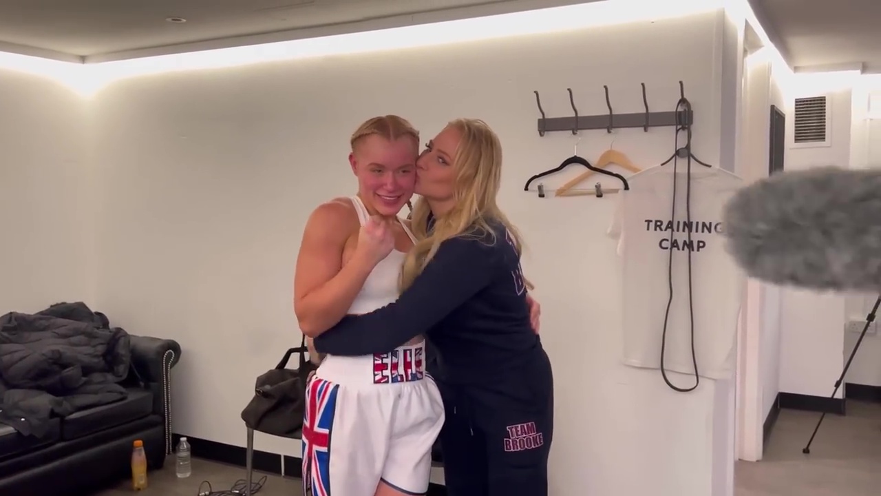 Elle Brooke jokes that Ebanie Bridges 'loves touching its bum', as behind-the scenes footage of her boxing victory emerges