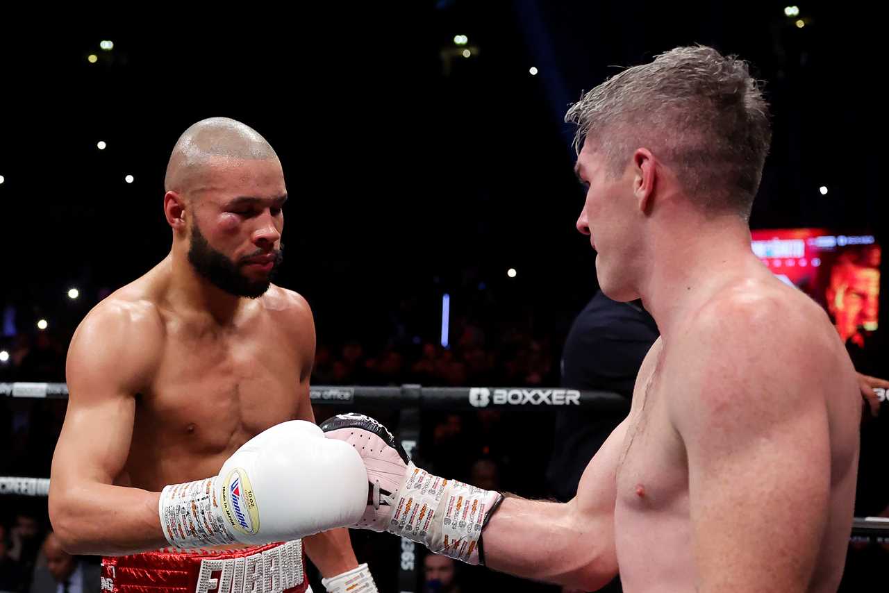 As Chris Eubank Jr was brutally knocked out, Liam Smith's coach held back Chris Eubank Jr.
