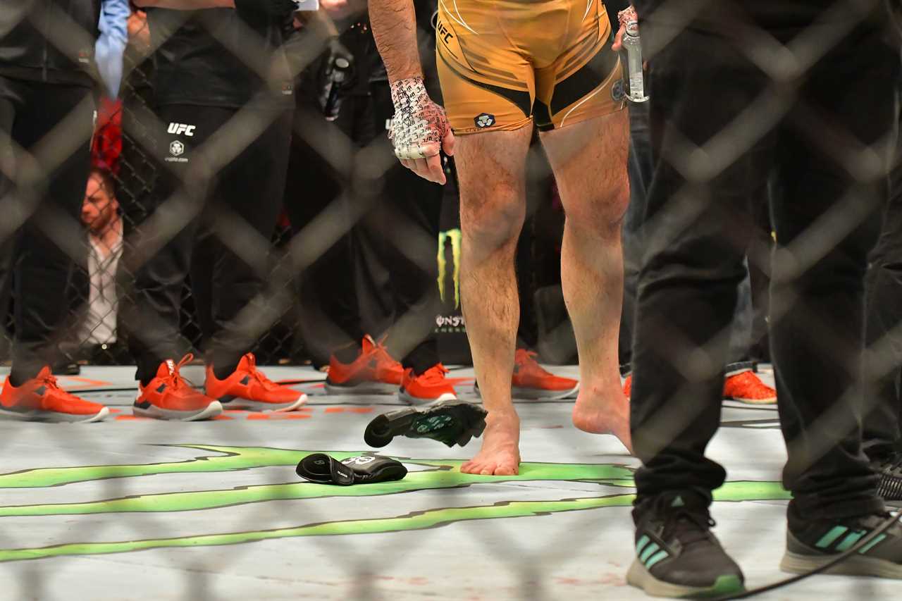 Glover Teixeira, UFC legend, shows his heavily-bandaged face after a brutal and bloody loss to Jamahal Hill