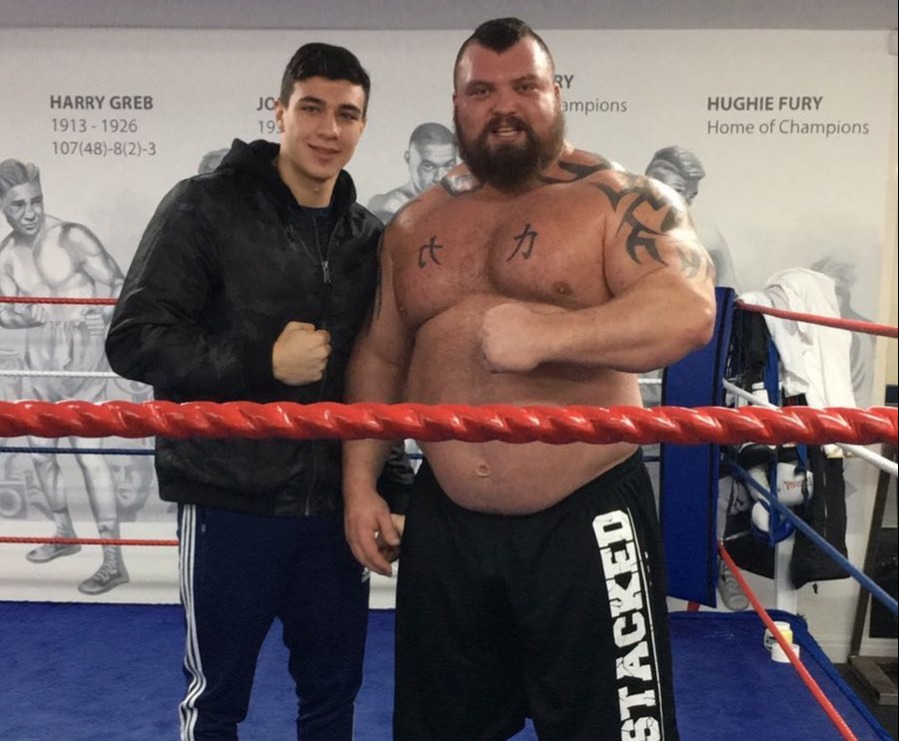 Tommy Fury, a skinny teenager next to Eddie Hall, is unrecognizable as Tommy Fury before he went on Love Island and became a pro boxer.