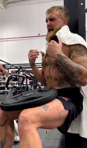 As Jake Paul bulks up for the Tommy Fury fight, watch his legs shake as he does a brutal training exercise.