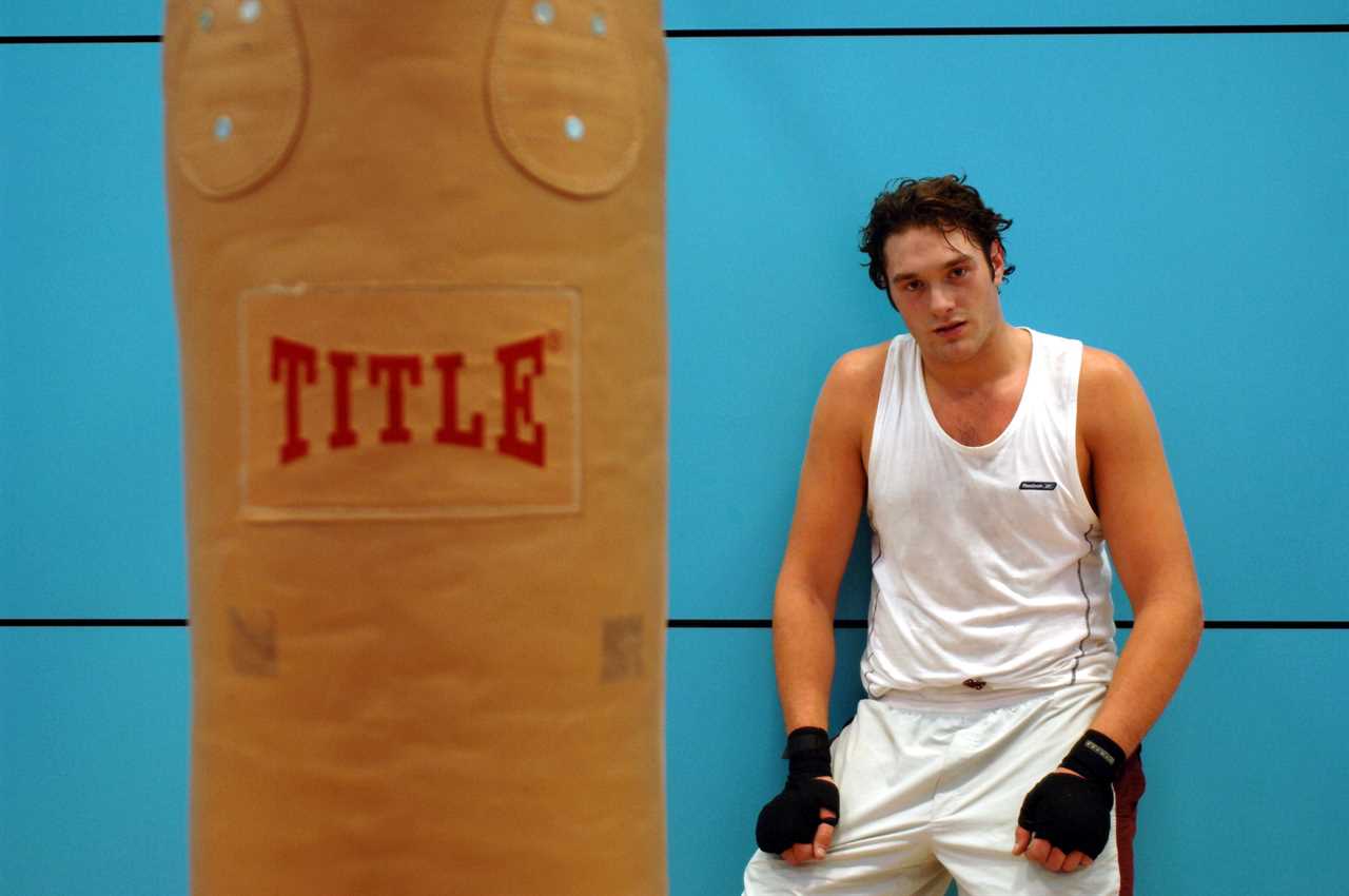 Tyson Fury, who was 6ft 4in tall and 14 STONE when first arrived at an amateur gym aged 14, was banned from boxing as a junior.