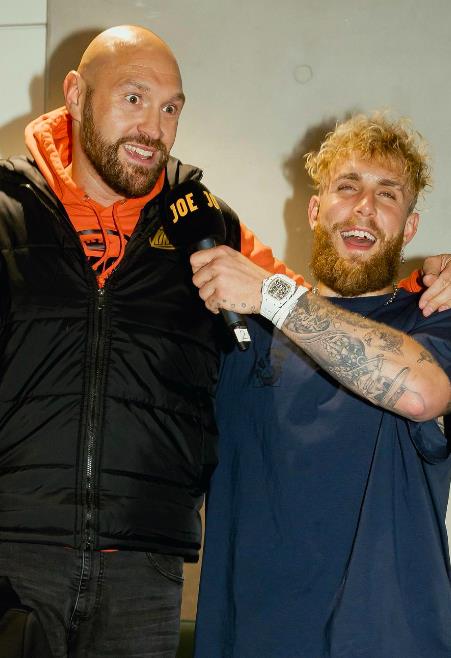 Tyson Fury jokes that Tommy, his brother, will go mad after taking a picture with Jake Paul in advance of bitter grudge fight