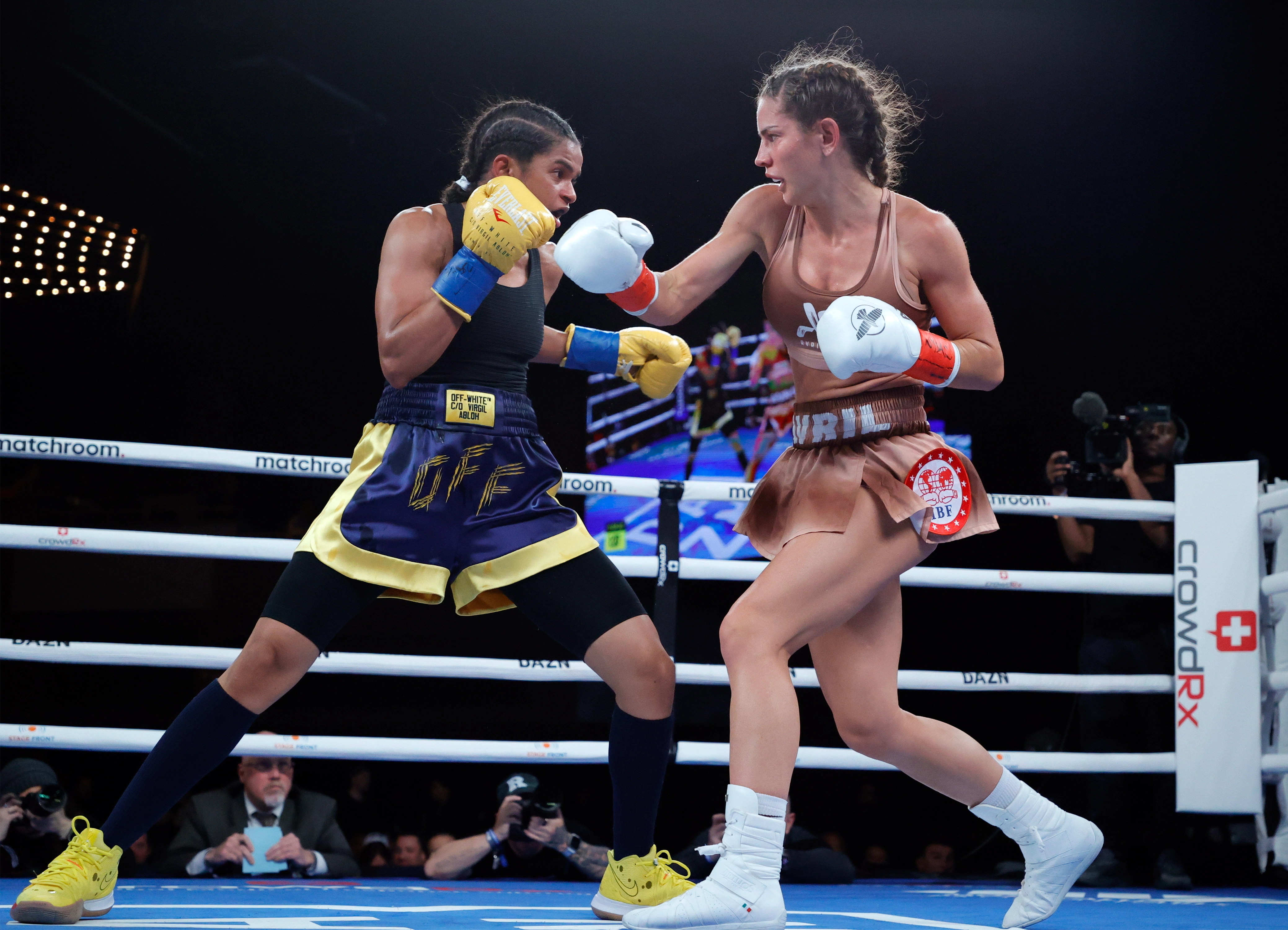 Avril Mathie, a swimsuit model and boxer, wants Ebanie bridges showdown. She wears skimpy clothes for weigh-ins.