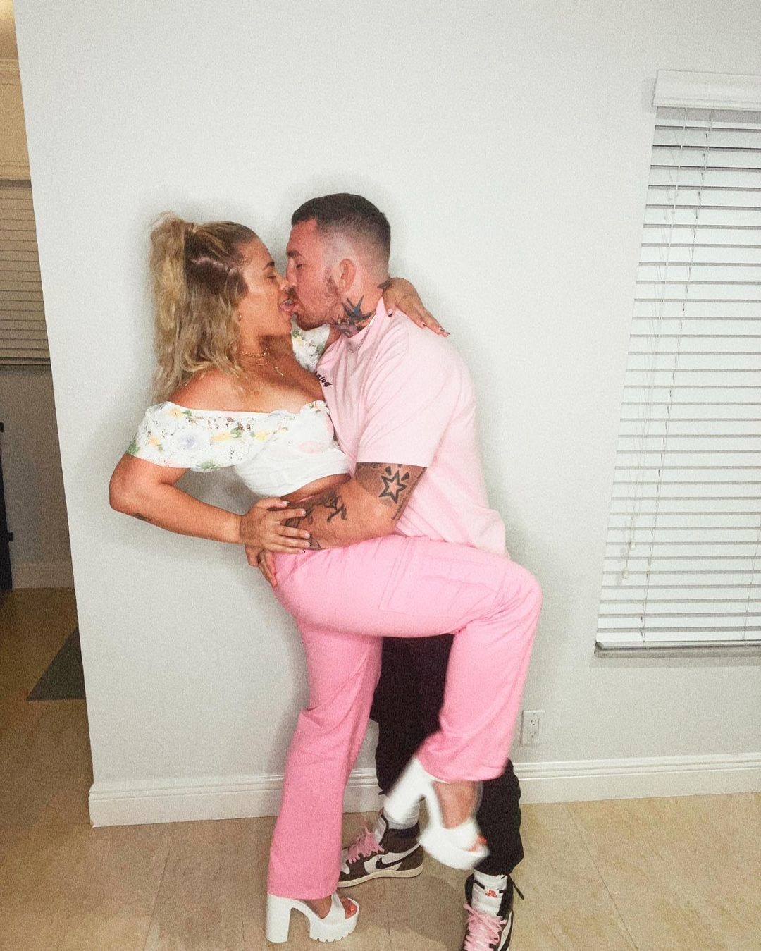 Paige VanZant nearly spills out of her top in a risky Instagram photo as she flaunts the cleavage of ex-UFC star.