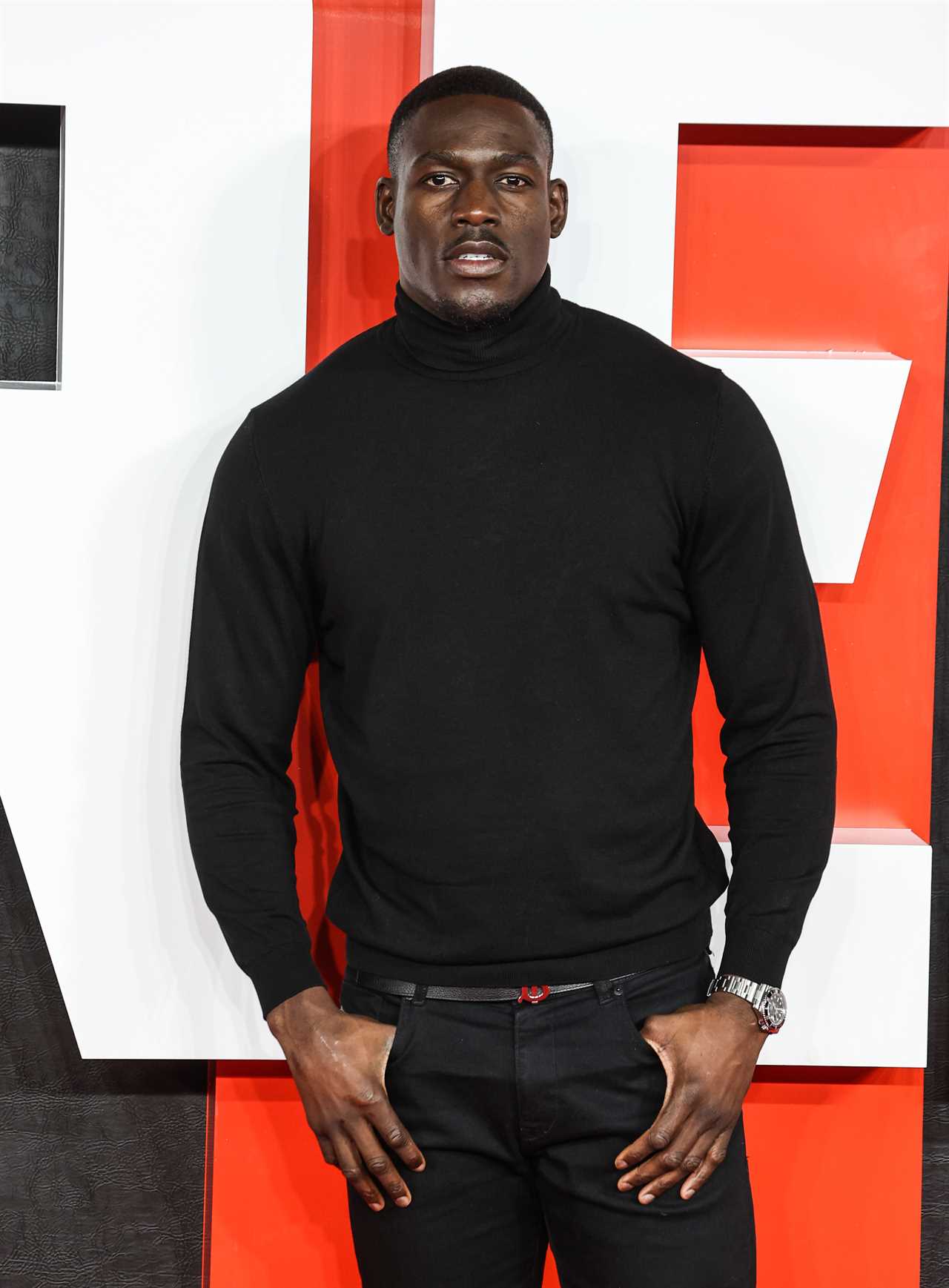 Lawrence Okolie and Richard Riakporhe meet at Creed III premiere. Boxers are kept back by friends in amazing scenes