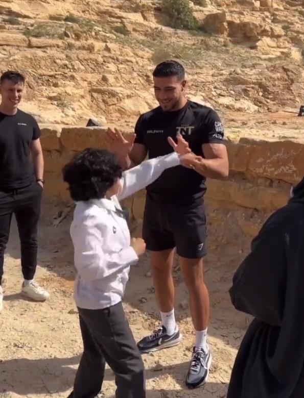 Tommy Fury hilariously tromps Jake Paul in Saudi Arabia as a kid tossing punches ahead of a mega fight