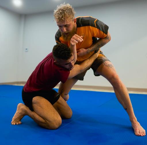 Jake Paul reveals when he will make his MMA debut with PFL. He secretly trained while at camp for Tommy Fury fights.